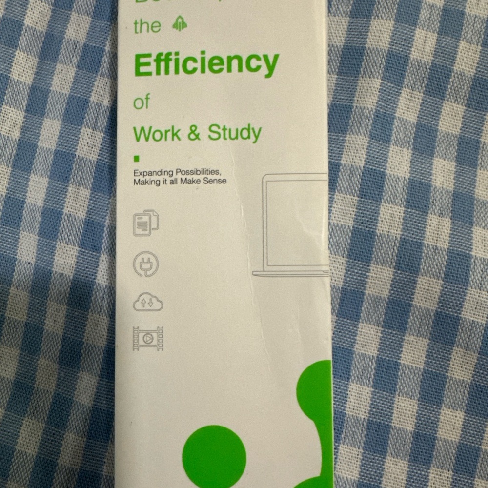 Green and White Adapter for Cell Phones
